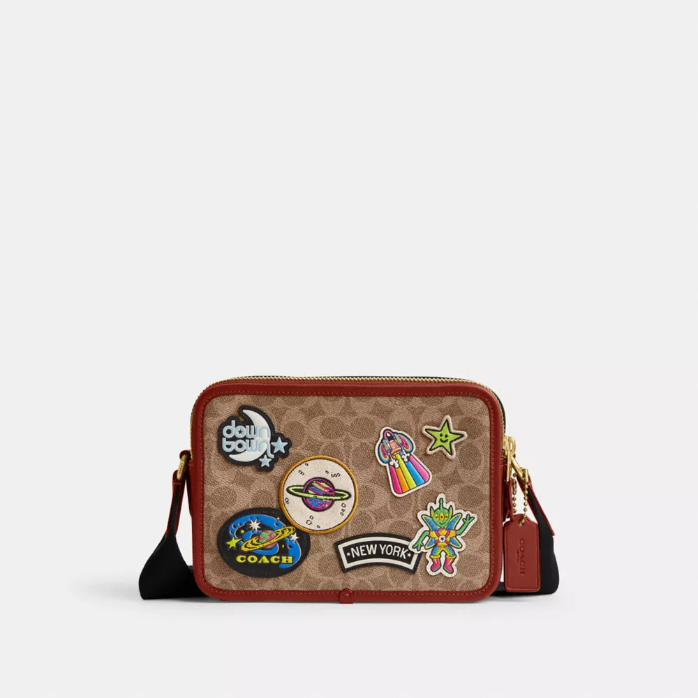 COSMIC COACH CHARTER CROSSBODY 24 IN SIGNATURE CANVAS WITH PATCHES